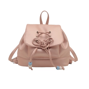 Mini sac à dos rose en cuir synthétique avec lacets croisés et perles bleues