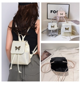 Detailed views of stylish women's backpack with metal butterfly decor and color options