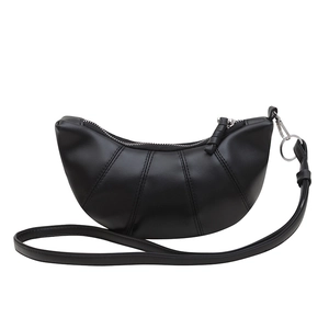 Chic black croissant shoulder bag with quilted details and sleek silver hardware