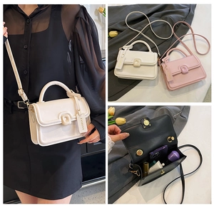 Internal view of fashion crossbody bag showing phone and lipstick storage compartments