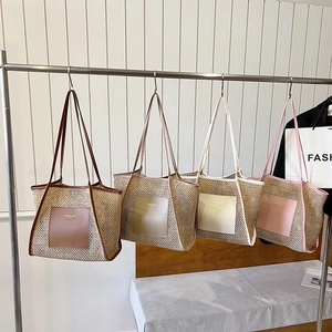 Large capacity hollow out woven straw tote bag in four colors for summer beach and commute