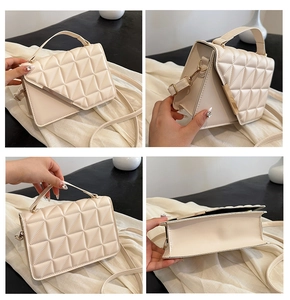 Detailed views of beige quilted crossbody bag with gold metal lock and chain strap