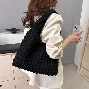 Chic black bubble texture tote bag with pleated fabric design for casual daily wear