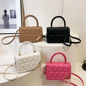 Minimalist quilted square crossbody bags with woven handles in four versatile colors