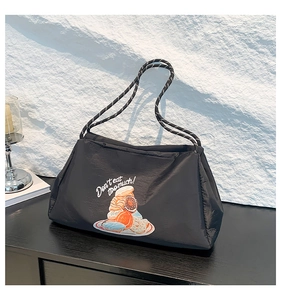 Sac fourre-tout en nylon noir matelassé avec imprimé donut et bandoulières en corde