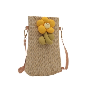 Oatmeal straw woven crossbody phone bag with a yellow sunflower and a smiling face