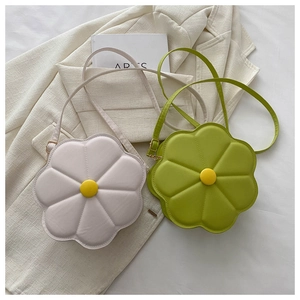 Detailed view of 3D floral pattern on matte PU leather crossbody bags in soft colors
