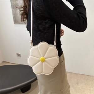 White floral PU leather shoulder bag with yellow button detail and quilted texture