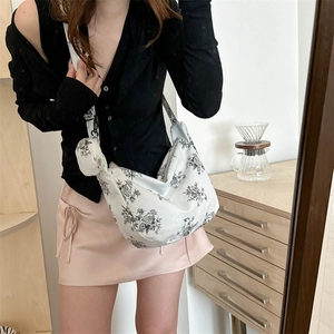 Floral corduroy hobo bag in white with matching round coin purse and wide strap