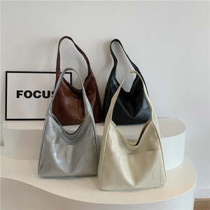 Minimalist geometric patchwork tote bags set in brown, black, silver, and cream colors
