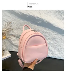 Mini sac à dos rose en cuir PU mat avec logo aimai et double fermeture éclair