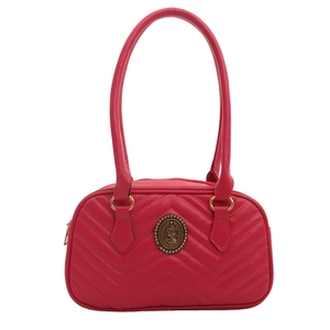 Magenta quilted shoulder bag with vintage gold medallion and elegant stitching