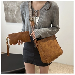 Retro brown leather tote bag with wide jacquard strap and matching wristlet clutch set