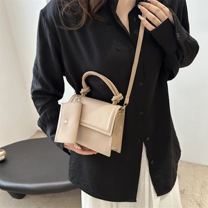 Elegant beige crossbody small square bag with knot handle and adjustable shoulder strap
