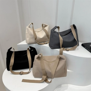 Minimalist large capacity nylon tote bags in four neutral colors with adjustable straps