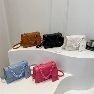 Quilted leather crossbody bags in five colors with chain straps and coin purses