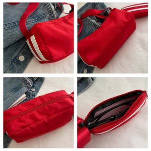 Details der roten Zylindertasche aus Nylon mit weißen Streifen und Innenkapazität