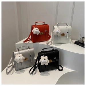 Chic retro faux leather backpacks in red, white, silver, and black with cute bear charms