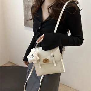 Chic cream white crossbody bag with cute bear embroidery and plush charm pendant