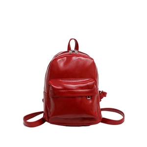 Bright red PU leather mini backpack with front zip pocket and silver hardware