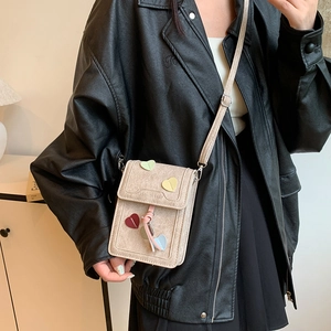 Fashionable mini light brown crossbody bag with colorful 3D heart decor and adjustable strap