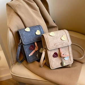 Fashion heart crossbody phone bag in retro blue and beige with heart decoration