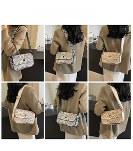 Detailed views of vintage striped crossbody bag with wide strap on fashion model