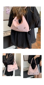 Pink underarm bag with 3D metal butterflies and textured fabric shown in multiple angles