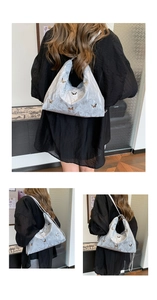 Detail of silver crinkled metallic tote bag with 3D butterfly charms and chain strap