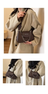 Detailed view of dark brown PU leather shoulder bag with decorative silver floral chain strap
