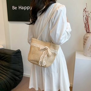 Large straw shoulder bag with lace bow decoration for summer beach vacation style