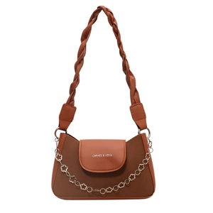 Brown vintage shoulder bag with woven strap and decorative silver floral chain detail