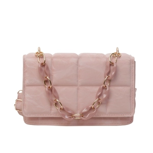Pink quilted square crossbody bag with metallic and resin chain strap on white background