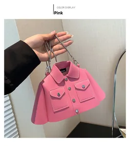 Detailed view of creative pink leather jacket shaped handbag with silver chain and metal buttons