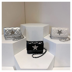 Three quilted square bags in silver, black and ivory with sparkling star emblems