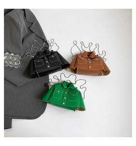 Macro shot of jacket-shaped mini crossbody bags in black, brown, and green leather