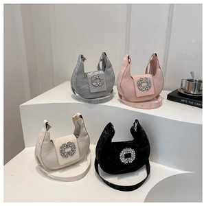 Multiple crescent hobo bags in assorted colors with sparkling rhinestone buckles