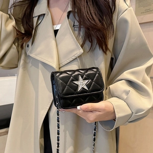 Quilted black leather crossbody bag with silver star ornament and chain strap