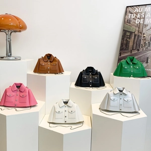Creative jacket-shaped mini crossbody bags in assorted candy colors with metal chain straps