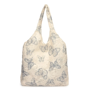 Minimalist off-white tote bag featuring a blue butterfly jacquard pattern and large capacity