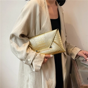 Elegant gold faux crocodile leather envelope clutch bag with flap closure for women