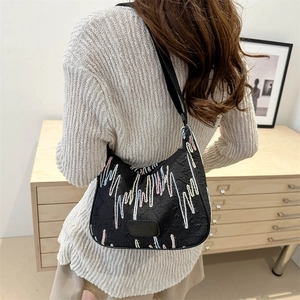 Black nylon dumpling bag with colorful wave embroidery and large capacity shoulder strap