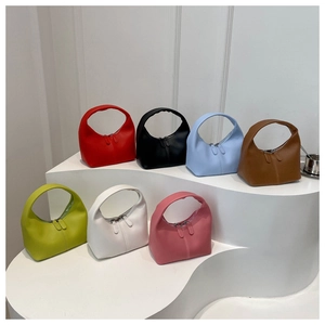 Detailed top view of colorful crescent handbags with premium zippers and smooth texture