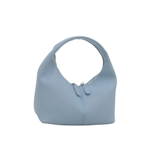 Minimalist light blue hobo bag with a semi-circle shape and elegant top handle design