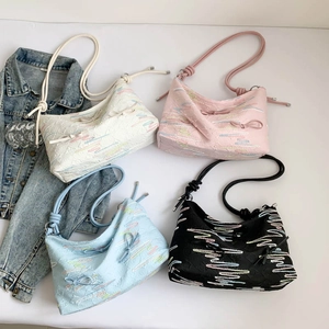 Chic tote bag set in four colors with rainbow stitching and woven shoulder straps