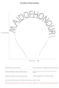 Detailed view of silver alloy headband with inlaid rhinestones spelling Maid of Honour