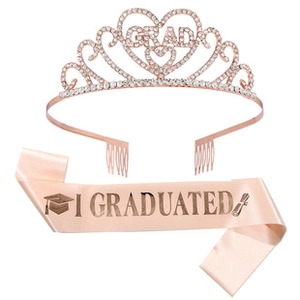 Close-up of rose gold GRAD tiara with rhinestones and pink satin I GRADUATED sash set