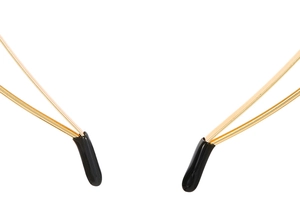 Detailed view of the gold headband ends with black rubber tips for comfortable wear