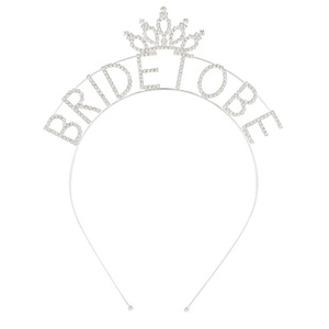 Detail view of silver rhinestone BRIDE TO BE headband with small crown for party