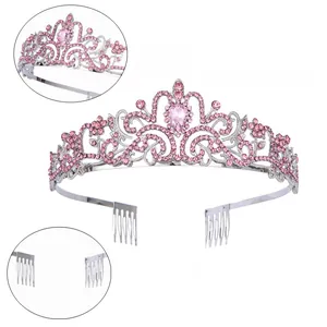 Detail of silver crown with pink rhinestones showing smooth hair combs and plating